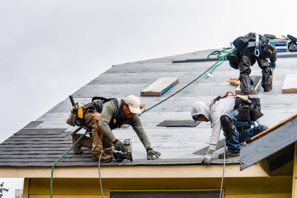 Professional Gutter Installation technician working in Elmore, OH